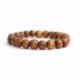 Bracciale uomo sfere legno miele